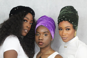 Women in velvet head wraps 